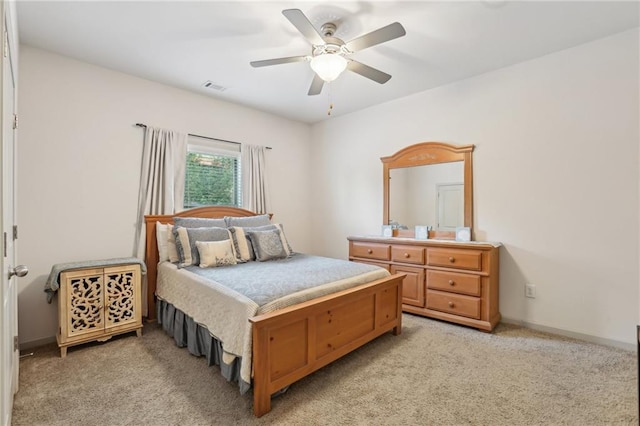 4459 Sierra Creek Dr, Hoschton, GA 30548 - bedroom with visible vents, a ceiling fan, baseboards, and light carpet