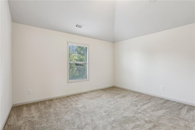 4459 Sierra Creek Dr, Hoschton, GA 30548 - unfurnished room with baseboards, lofted ceiling, visible vents, and carpet