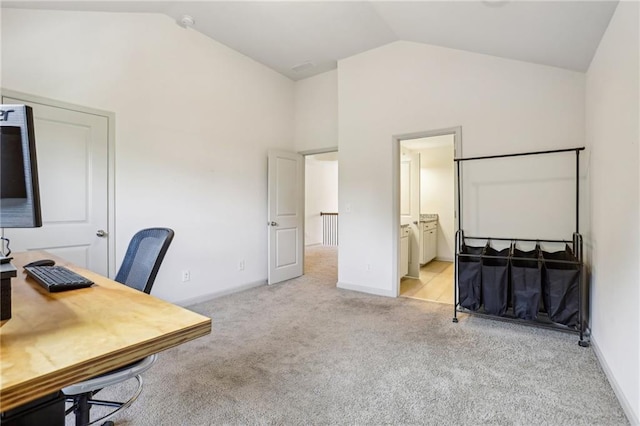 4459 Sierra Creek Dr, Hoschton, GA 30548 - home office featuring lofted ceiling, light carpet, and baseboards