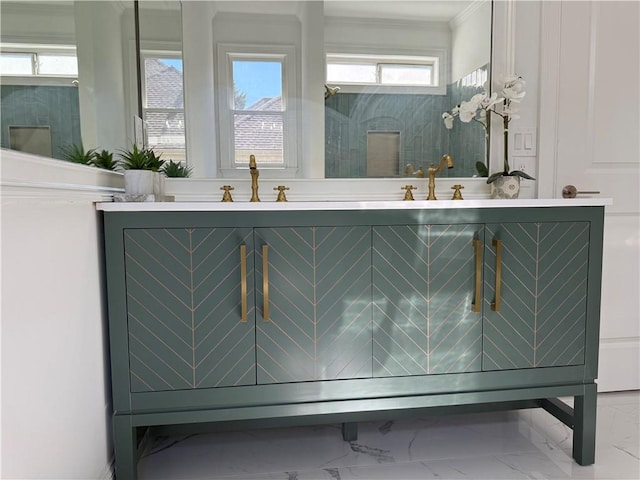 bathroom featuring vanity and a wealth of natural light