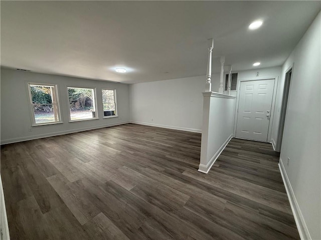 laundry area with sink, cabinets, electric dryer hookup, dark hardwood / wood-style floors, and hookup for a washing machine