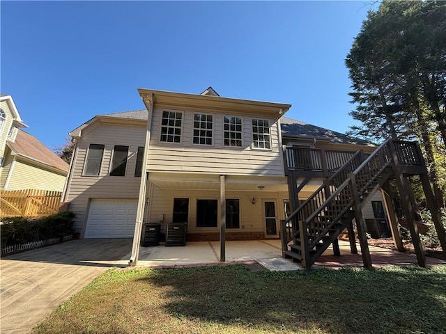 back of house with a garage