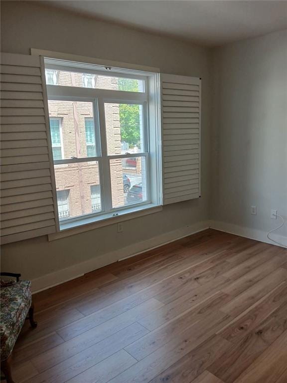 3655 Peachtree Rd Unit 203, Atlanta, GA 30319 - spare room featuring wood finished floors