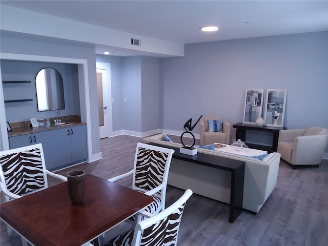 3655 Peachtree Rd Unit 203, Atlanta, GA 30319 - living area with dark wood-style floors and recessed lighting