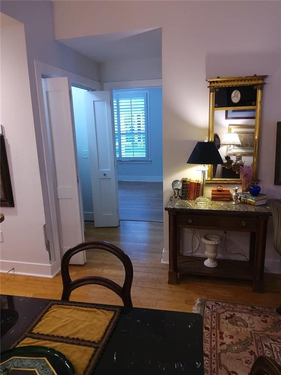 3655 Peachtree Rd Unit 203, Atlanta, GA 30319 - hallway with baseboards and wood finished floors