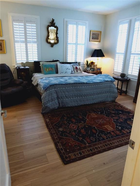 3655 Peachtree Rd Unit 203, Atlanta, GA 30319 - bedroom with wood finished floors