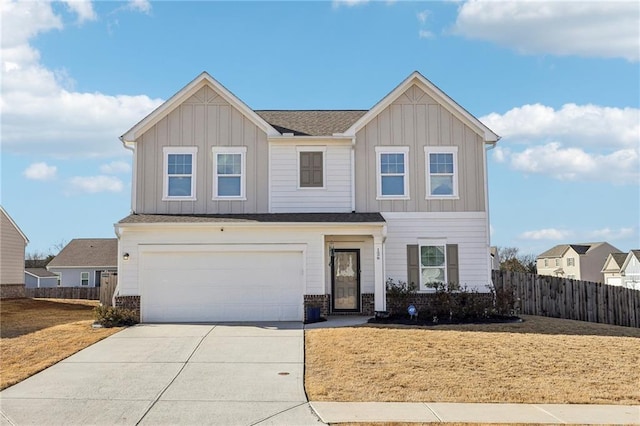 view of front of house with a front lawn and a garage