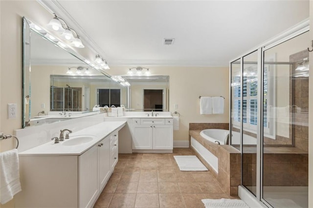 bathroom featuring ornamental molding, a sink, visible vents, and tile patterned floors