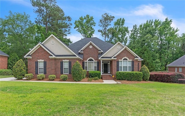 656 Deerwood Way, Evans, GA 30809 - view of front facade with brick siding and a front lawn