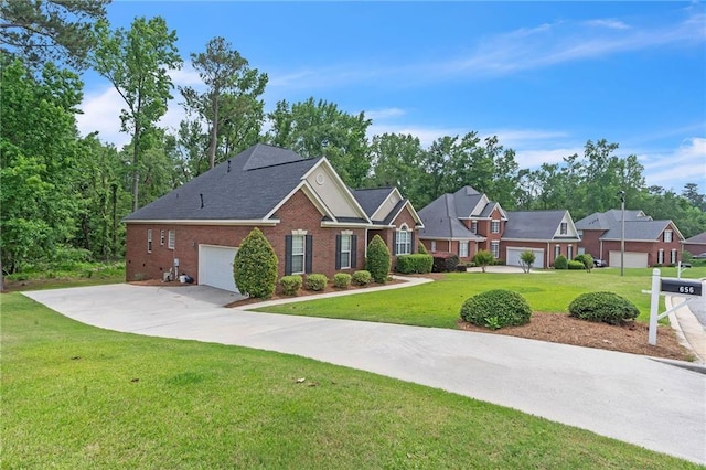 656 Deerwood Way, Evans, GA 30809 - view of front of property with brick siding, a front yard, concrete driveway, and a garage