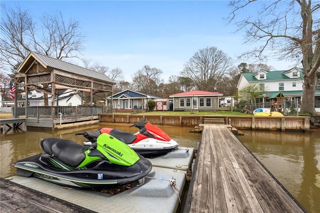 view of dock with a water view