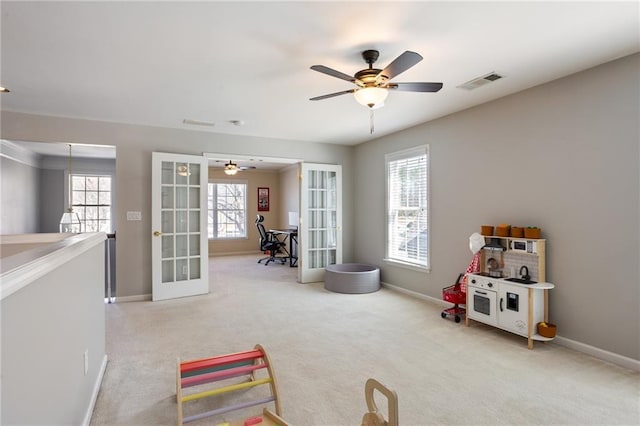 game room with plenty of natural light, french doors, and visible vents