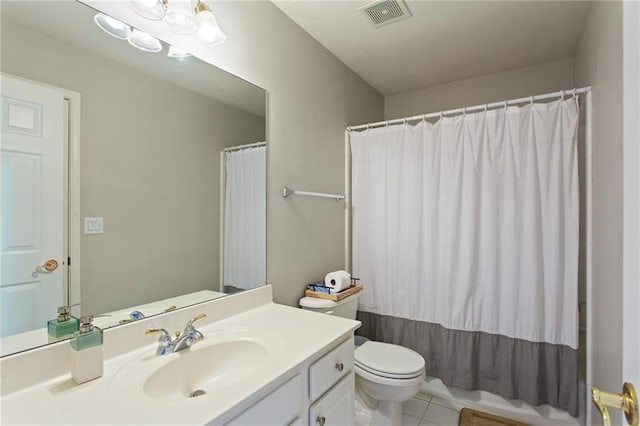 full bathroom featuring visible vents, a shower with curtain, toilet, tile patterned flooring, and vanity