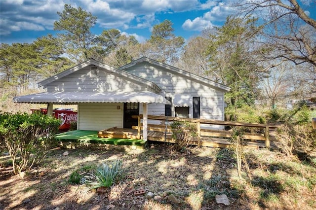 view of front of home with a deck