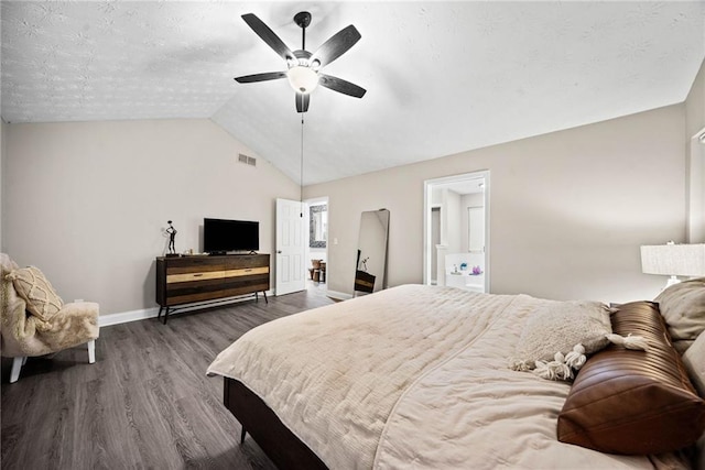 bedroom with lofted ceiling, dark hardwood / wood-style floors, and ceiling fan