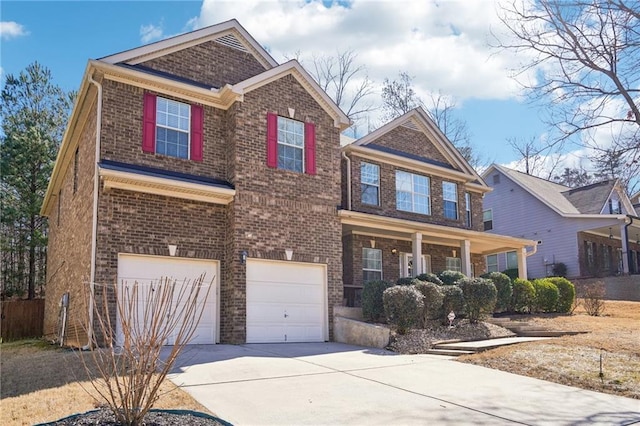 craftsman inspired home featuring concrete driveway, brick siding, and an attached garage