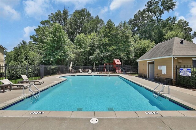 view of pool featuring a patio