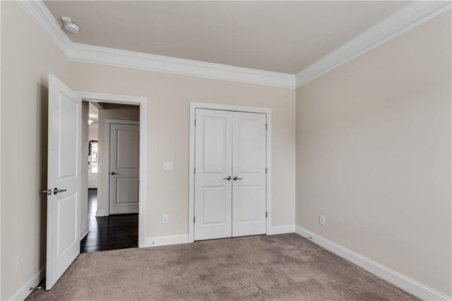 3950 Grandview Manor Dr, Cumming, GA 30028 - unfurnished bedroom with carpet floors, crown molding, and baseboards