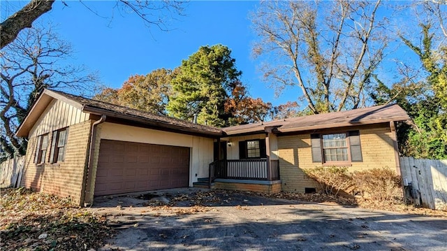 single story home with a garage