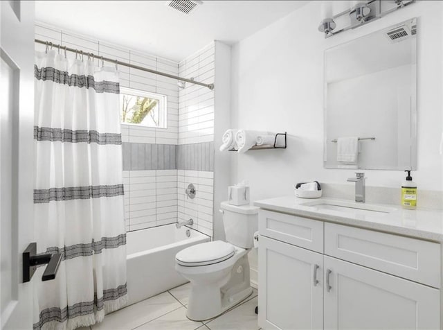 full bathroom with toilet, tile patterned flooring, vanity, and shower / tub combo