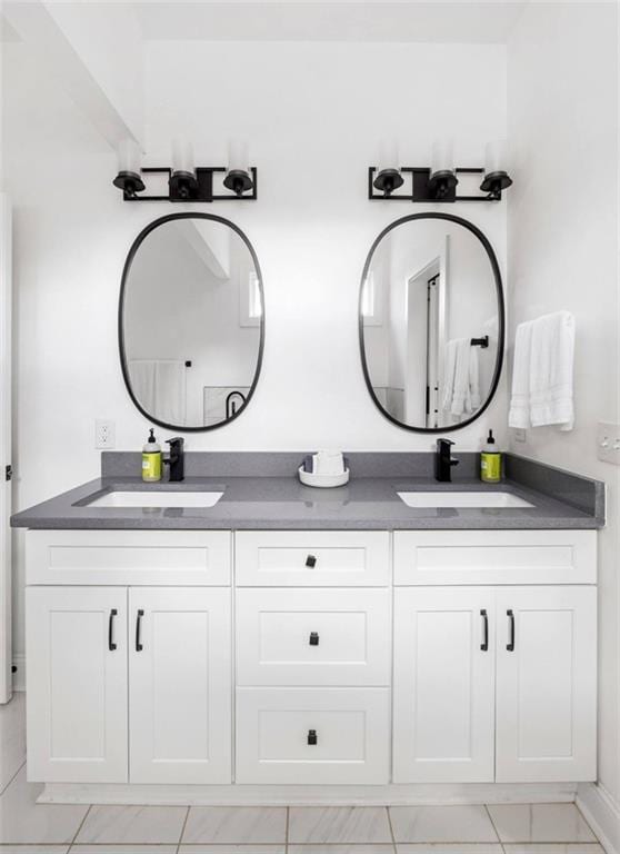 bathroom featuring vanity and tile patterned flooring