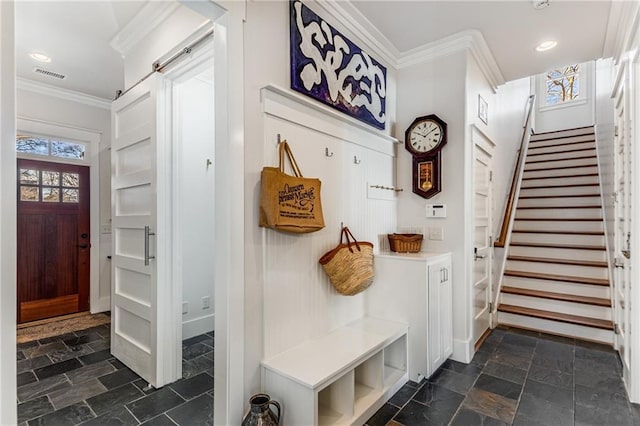 mudroom featuring crown molding, stone tile floors, visible vents, and recessed lighting