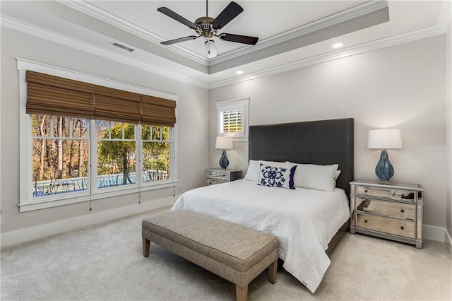 bedroom featuring carpet flooring, crown molding, a raised ceiling, recessed lighting, and visible vents