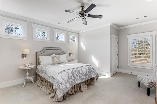 bedroom with visible vents, ornamental molding, and multiple windows