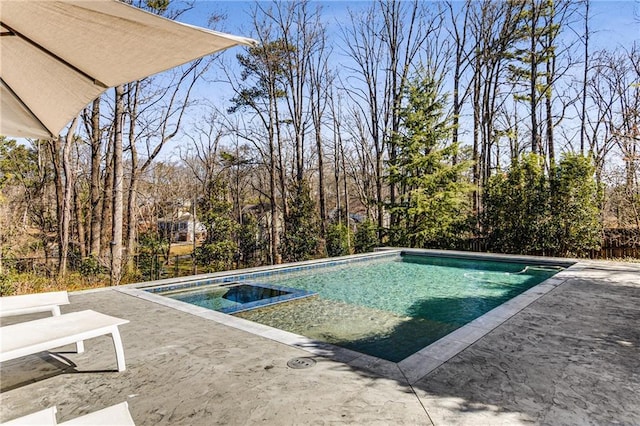 outdoor pool featuring a patio area