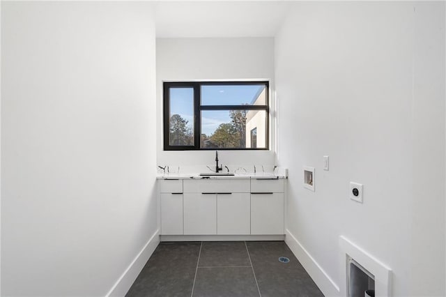 bathroom with tile patterned flooring and sink