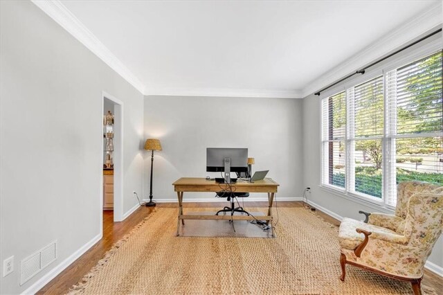 3921 Upland Way, Marietta, GA 30066 - office area featuring baseboards, wood finished floors, visible vents, and ornamental molding