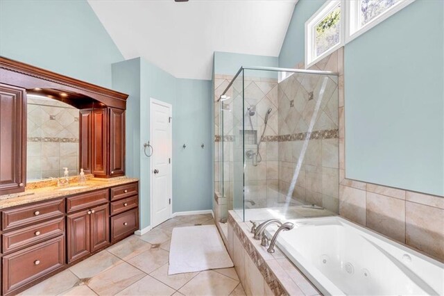 3921 Upland Way, Marietta, GA 30066 - bathroom featuring a whirlpool tub, lofted ceiling, vanity, and a stall shower