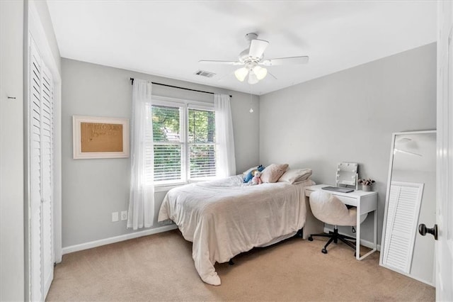 3921 Upland Way, Marietta, GA 30066 - bedroom with ceiling fan, visible vents, baseboards, and light carpet