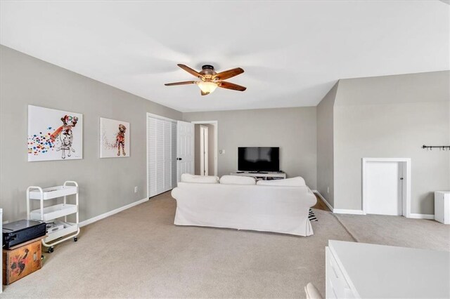 3921 Upland Way, Marietta, GA 30066 - living room featuring ceiling fan, light carpet, and baseboards
