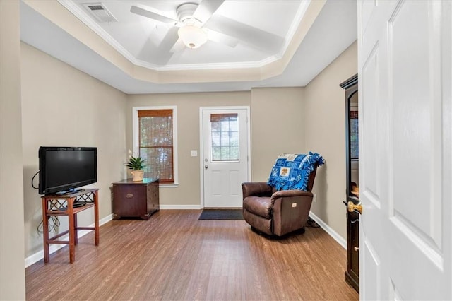 3921 Upland Way, Marietta, GA 30066 - sitting room featuring a tray ceiling, wood finished floors, visible vents, a ceiling fan, and baseboards