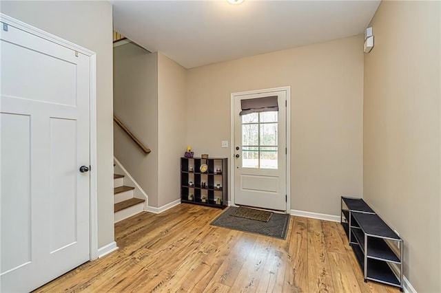 foyer entrance featuring wood-type flooring