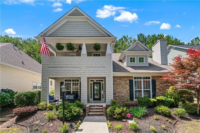 859 Scales Rd, Suwanee, GA 30024 - view of front of house featuring stone siding and covered porch