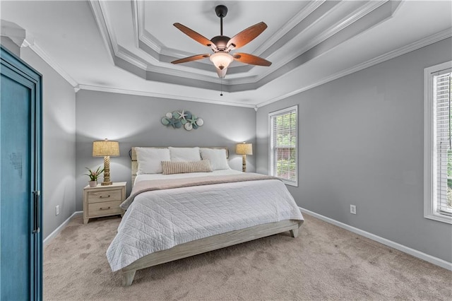 859 Scales Rd, Suwanee, GA 30024 - bedroom with a raised ceiling, light colored carpet, ornamental molding, baseboards, and a ceiling fan