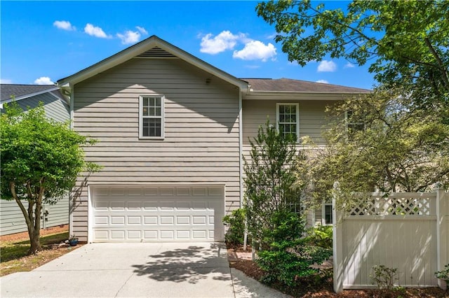 859 Scales Rd, Suwanee, GA 30024 - view of front of home featuring concrete driveway and a garage