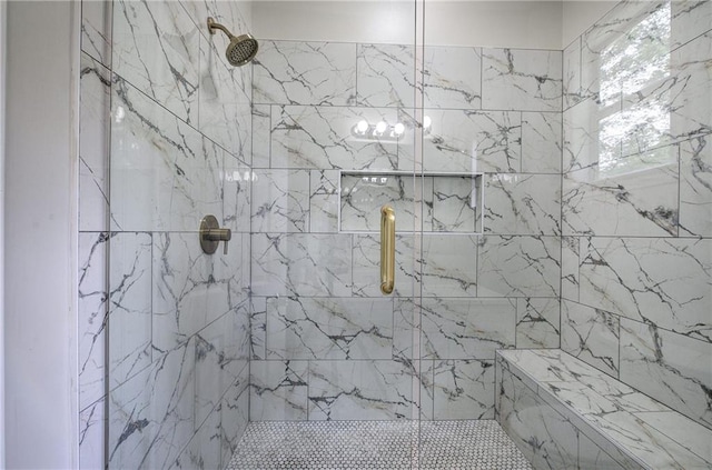 bathroom with a stall shower