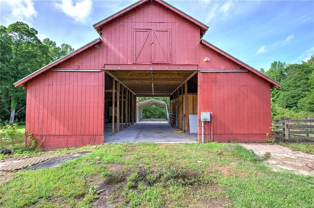 view of barn with an exterior structure