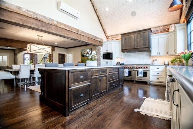 202 Hickory Chase, Carrollton, GA 30117 - kitchen with built in microwave, light countertops, dark brown cabinetry, double oven range, and high vaulted ceiling