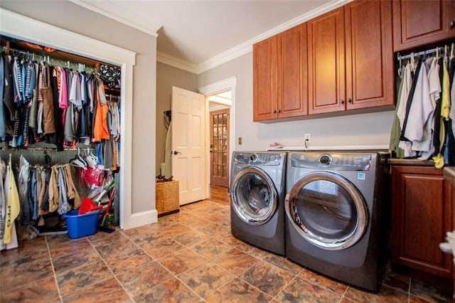 202 Hickory Chase, Carrollton, GA 30117 - laundry room featuring washing machine and clothes dryer, cabinet space, crown molding, and baseboards