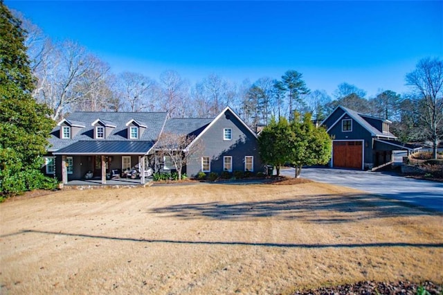 202 Hickory Chase, Carrollton, GA 30117 - view of front facade with a porch, concrete driveway, and a garage