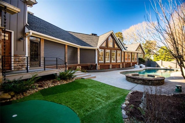 202 Hickory Chase, Carrollton, GA 30117 - back of property with roof with shingles and a patio