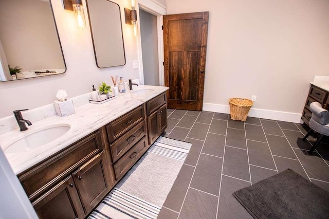 202 Hickory Chase, Carrollton, GA 30117 - full bath with double vanity, tile patterned flooring, and baseboards