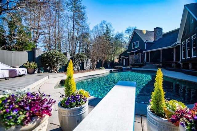 202 Hickory Chase, Carrollton, GA 30117 - view of pool featuring a diving board, a wooden deck, and fence