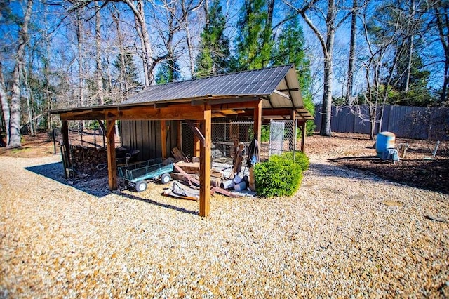 202 Hickory Chase, Carrollton, GA 30117 - view of patio / terrace featuring an outbuilding and fence