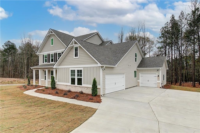 view of front of house with a garage and a front yard