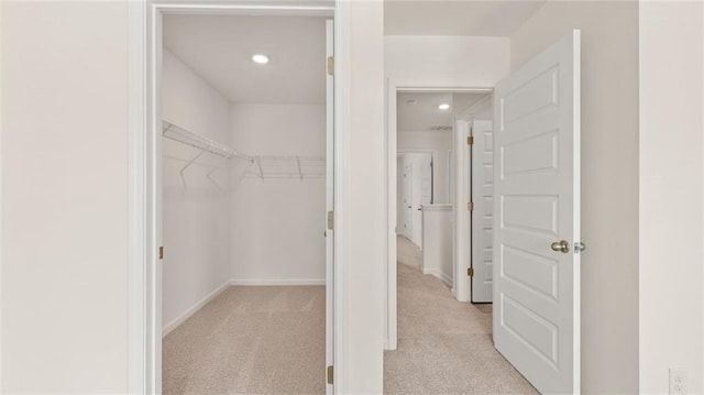 613 Lobelia Way, Locust Grove, GA 30248 - spacious closet featuring light colored carpet